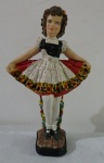 Escultura em estuque com rica policromia representando dançarina portuguesa. restauro no pescoço imperceptível, alt. 21cm