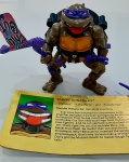 Boneco clássico Donatello Tartarugas Ninjas. Com acessorios.