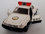 Yonezawa- Miniatura carro de policia Toyota Crown Royal Saloon, metal de fabricação japonesa 1989. Pintura origial com desgastes, carrinho integro sem quebrados. Mede 05x15x6. Obs: os lotes que compõe esse leilão faziam parte do acervo de um grande colecionador de brinquedos.