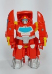 Lindo Transformers  - HASBRO - TOMY - Vietnam. Plástico rígido - Possui dispositivo de transformação nas costas. Medida: 13 cm de altura x 10 cm x 4,5 cm.