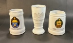 Trio de canecas de porcelana da cervejaria Baden Baden, sendo uma delas do Oktoberfest 2018 - dim - 16 cm de altura maior e 13 cm menor