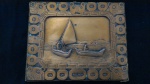 Quadro em resina cobreada, com represençao de embarcações, Bolivia século XX.  Medidas: Comp: 18cm LArg: 22cm