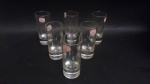 Conjunto de 6 copinhos para vodka em vidro lapidado. Altura 8,5 cm.