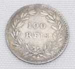 Portugal - Moeda de 100 reis em prata 835, datada de 1864, período Reino de Portugal. Medindo 20mm, pesando 2,5 gramas.