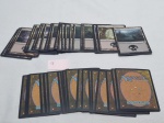 Lote de aproximadamente 50 cartas sortidas do jogo Magic.