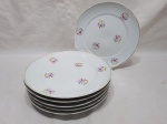 Jogo de 6 pratos rasos de mesa em porcelana Real, friso ouro e floral. Medindo 24cm de diâmetro. Com desgaste no friso.