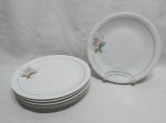 Jogo de 6 pratos rasos de mesa em porcelana Renner floral com friso ouro. Medindo 25cm de diâmetro.