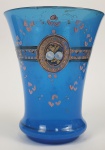 IMPERIO AUSTRO HUNGARO - RICO GOBLET DE TRADIÇÃO BOHEMIA EM VIDRO OPALINO AZUL  COM RICOS ESMALTES FLORAIS E ARREMATES EM OURO. BOHEMIA,  FINAL DO SEC. XIX. 12 X 9 CM