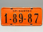 COLECONISMO - Placa automotiva em alumínio - Laranja - SP - São Paulo - 1-89-87. Med. 13x40 cm.