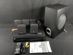 DVD Home Theater LG modelo HT202SF funcionando, sem garantias futuras. Acompanham 5 pequenas caixas de som e um subwoofer. Equipamento em muito bom estado de conservação.