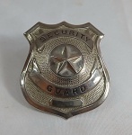 Curioso badge ou distintivo de Security Guard. Mede 6,5cm de altura.