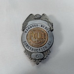 Badge ou distintivo police - Harwood-Nebel Construction Co. Fabricado em material metálico. Mede 6,5cm de altura