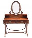 Móvel toalete de madeira nobre, de estilo eclético com influência dos estilos ditos império tardio e "Thonet". Brasil - Século XX. Med. 158 x 114 x 46 cm (ME). Estrutura com parte inferior guarnecida por duas gavetas com puxadores de metal. Na parte superior, espelho. Marcas de uso. Desgastes. Presença de pequenas intervenções. No estado. Acervo Particular - Rio de Janeiro /RJ.