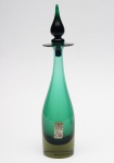 CRISTAL CÁ D'ORO - Garrafa em grosso cristal Cá d'Oro, verde. Apresenta a etiqueta da Manufatura. Med. Alt. 32,0 cm.
