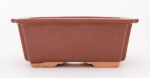 VASO  bonsai retangular, com quinas recortadas, em cerâmica de cor chocolate. Med. Alt. 7,0 cm  Compr. 15,5 cm  Larg. 12,0 cm.