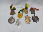 Lote de 8 moedas esportivas diversas para colecionador, peças gravadas.