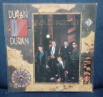 LP Duran Duran - Seven an The Ragged Tiger (1983) apa e Disco VG+ com encarte