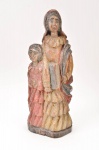 Mestra Eunice - Imagem de Sant'Ana Caminhante em madeira esculpida à mão com policromia, assinada na base, altura 44 cm.
