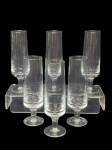 <B>VIDROS</b>, lote com seis (6) taças para champanhe confeccionadas em vidro translucido, haste cilíndrica, apoiada sobre base circular, medindo 16x4cm.