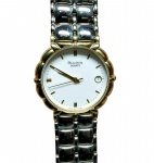 RELÓGIO BULOVA SWISS - ELEGANTE MODELO VINTAGE - BELA CAIXA DE 32 MM EM AÇO DOURADO COM FINO ACABAMENTO, PULSEIRA NOVA DE 17 MM EM AÇO. FUNÇÕES: HORAS, MINUTOS, SEGUNDOS E CALENDÁRIO. RESISTENTE À ÁGUA. MOVIMENTO QUARTZ SWISS DE PRECISÃO FUNCIONANDO EM EXCELENTE ESTADO DE CONSERVAÇÃO, ACONDICIONADO EM ESTOJO ORIGINAL.