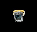 ELEGANTE ANEL EM OURO AMARELO 18 K TEOR 750, DESIGN CLÁSSICO DE EXCEPCIONAL OURIVESARIA COM RICO TRABALHO EM OURO BRANCO, BELÍSSIMA TURMALINA DE 8.0 X 6.0 MM, CLÁSSICA LAPIDAÇÃO OCOTOGONAL BRILHANTE, ADORNADA POR PRECIOSA COROA DE BRILHANTES. EXCELENTE ESTADO DE CONSERVAÇÃO. ARO MEDE 1,8 CM. PESO TOTAL 6.7 GRAMAS.