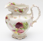 J & G MEAKIN - Jarra em faiança inglesa esmaltada e vitrificada com decoração floral. Altura: 29cm.