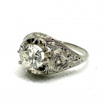 JÒIAS DIAMANTE - Importante anel art deco em platina com diamante central em lapidação Amsterdam com