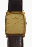 BAUME & MERCIER : Relógio de pulso masculino , original com caixa em aço e ouro, movimento a quartzo , pulseira original e couro , máquina ETA 210001/ bateria 341). Med. 3 x 2,5 cm (caixa)