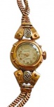 SALERO : Relógio de pulso feminino , movimento manual a corda , caixa e pulseira  em ouro amarelo 14 k , não revisado. Peso bruto. 14,5 gr . Med. 2 cm diam