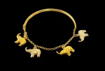 Pulseira com pingentes elefantes em ouro amarelo 18 k . Peso 8,9 gr Med. 5,7 x 7 cm