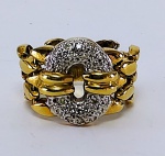 Anel flex em ouro amarelo e branco com diamantes. Peso. 8,9 gr Aro 18