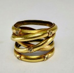 Anel em ouro amarelo 18 k . Peso 5 gr . Aro 17