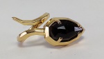 Anel em ouro amarelo 18 k com onix negro . Peso 7,3 gr Aro 14