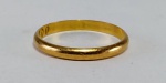Aliança em ouro amarelo 18 k. Peso 2,8 gr Aro 27