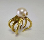 Anel polvo em ouro amarelo 18 k 750 com pérola. Peso 11,6 gr Aro 14