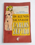 Antiga Revista  Erótica - Os Alunos Sacanas de Carlos Zéfiro - 5 Histórias Completas - Organizador: Joaquim Marinho - Editora Marco Zero - 1986 - 2 edição - Coleção Imoralidades Diversas - 94 páginas com ilustrações. Medida: 20,5 cm x 14 cm x 1 cm. OBS: Possui manchas nas primeiras e últimas páginas. Conforme fotos.