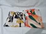 Lote de 2 camisas estampadas. Tam G