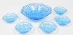 Bowl com 5 pratinhos de vidro azul. Diâmetro do bowl: 26 cm x 7 cm de altura. Pratinhos: diâmetro: 13 cm x 4 cm de altura.