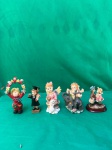 Bonito conjunto de 5 bibelôs em miniatura. Como se encontra nas fotos, o mais alto mede 11 cm de altura.   