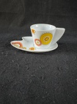 Silla.Vintage, xicara de café vintage, com um designer elegante e decoração floral. Com se encontra nas fotos.   