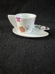 Silla.Vintage, xicara de café vintage, com um designer elegante e decoração floral. Com se encontra nas fotos.   