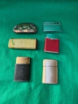 Conjunto com 6 isqueiros com bonita designer, os isqueiros estão funcionais, mas estão descarregados. Conforme nas fotos.  