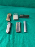 Conjunto com 6 isqueiros com bonito designer, os isqueiros estão funcionais, mas estão descarregados. Conforme nas fotos.  