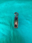 Antiga roldana em bronze, em perfeito funcionamento, medindo 11 cm de comprimento.