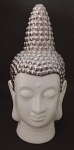 Escultura em Cerâmica representando Cabeça de Hindu , todo embelezado com detalhe prateado . Medindo : 22,5 x 10,5 x 10,5 cm.