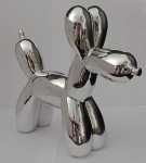 Belíssima Escultura cofre em cerâmica  , representando cachorro balão metalizado . Medindo : 20 x 25 cm .