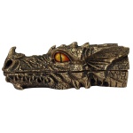 Incensário cabeça de dragão super exótico, confeccionado em resina dourada para suporte de incenso. Excelente acabamento, rico em detalhes e com a pintura realizada a mão. Medidas: Altura: 9 cm. Largura: 8 cm. Comprimento: 24 cm.
