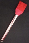 Pincel de silicone de inox com cabo rose . Medida total : 25 cm