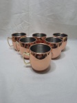Jogo de 6 canecas em aço cobreado, Moscow Mule. Medindo 8,5cm x 9,5cm de altura.