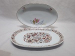 Lote de 2 travessas ovais em porcelana Real Floral. Medindo a maior 28cm x 19cm.